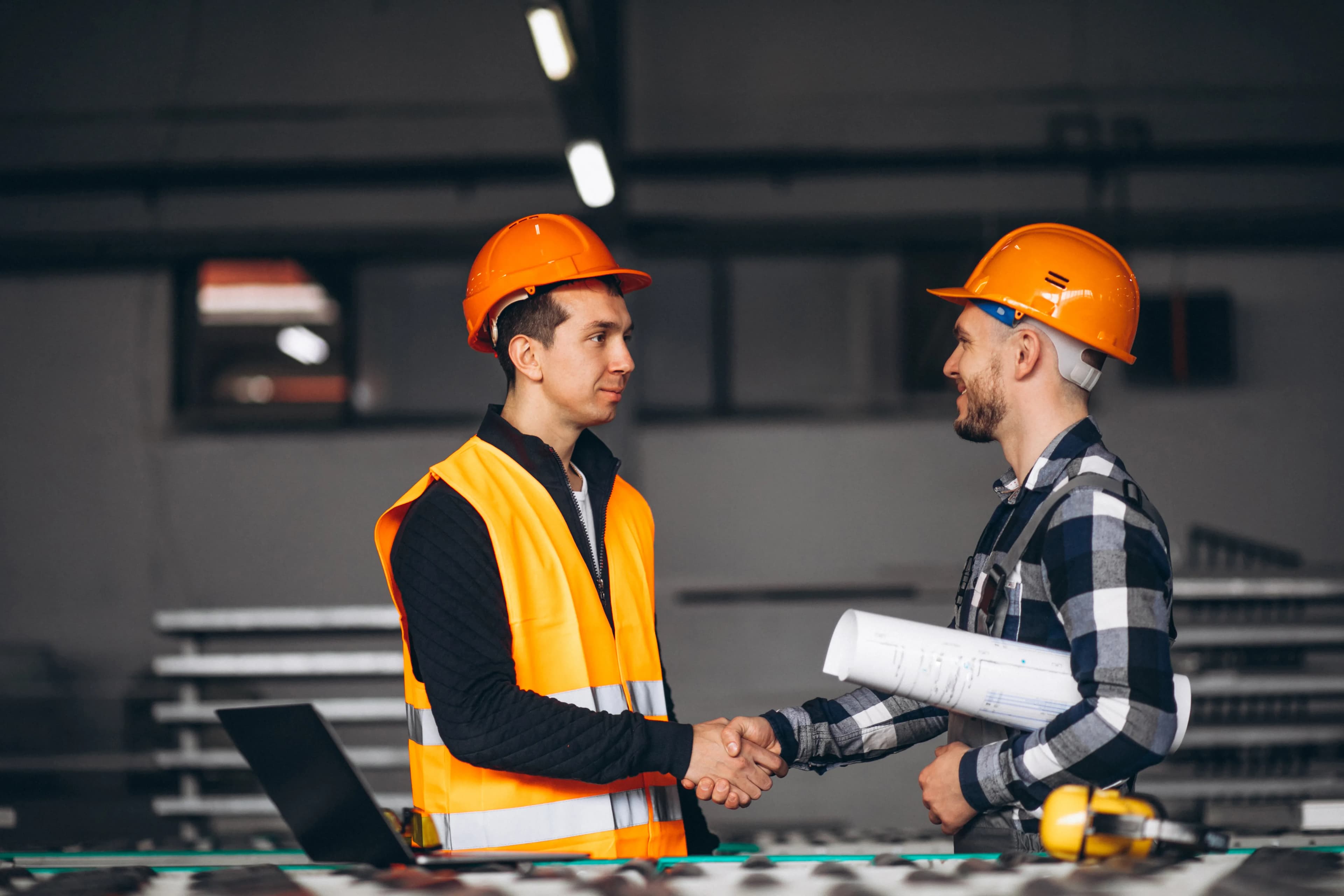Two engineering colleagues on a factory floor